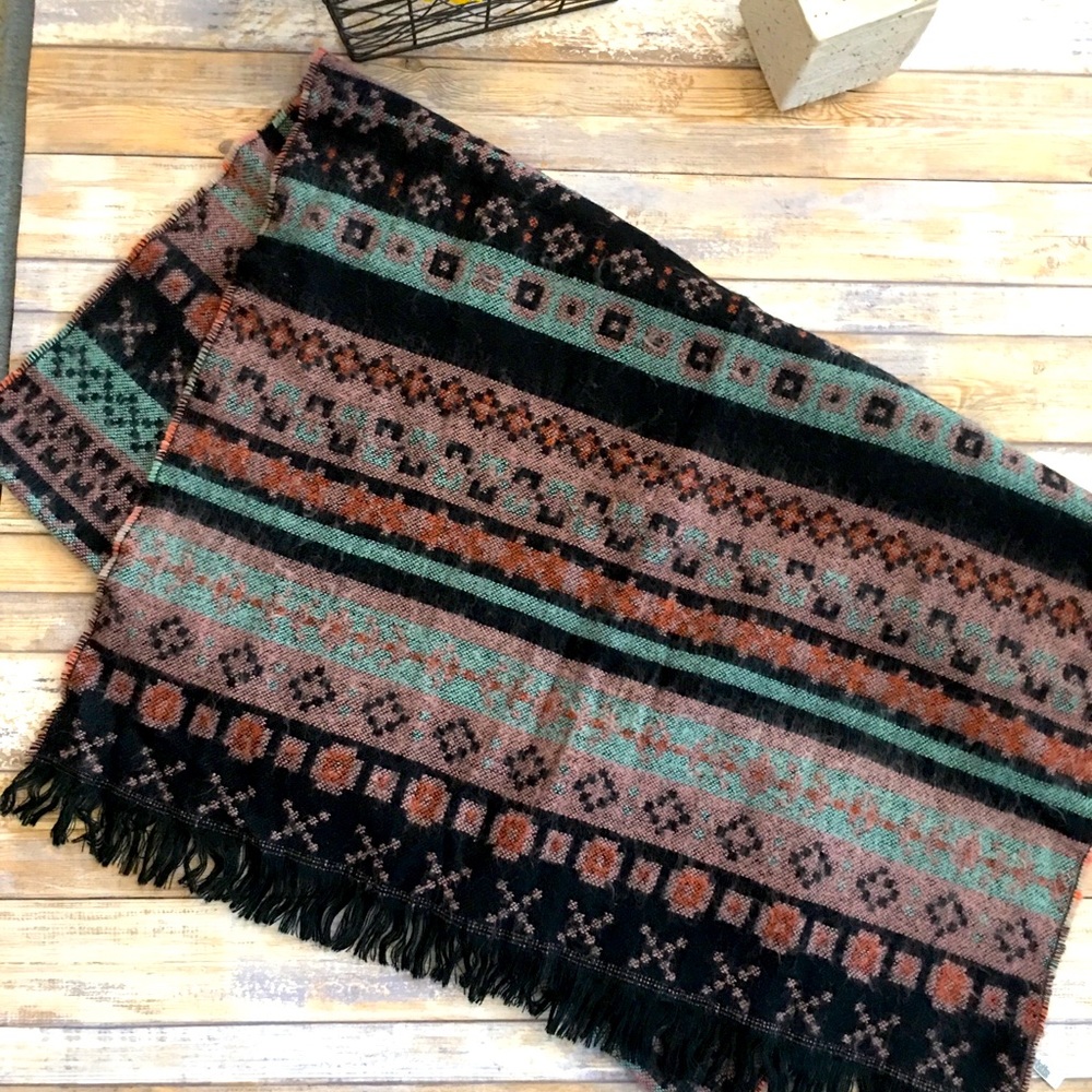 Great scarf for the season! Warm..not as bulky as a large blanket scarf!